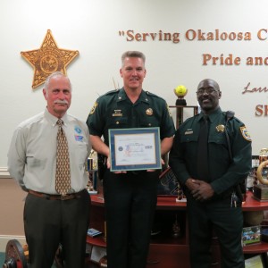 From left to right: ESGR Representative Terry Dawkins, Sheriff Larry Ashley, and Deputy Ike Kenty