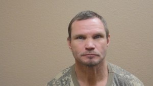 Crestview Man Wanted on Aggravated Assault Charge Surrenders After Attempting to Flee Into Woods