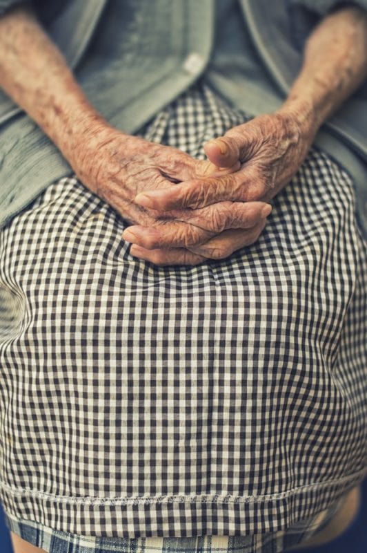 photo of elderly woman's hands on her lap